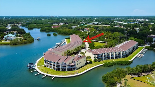 birds eye view of property featuring a water view