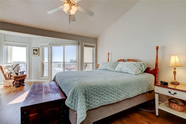 bedroom featuring vaulted ceiling, baseboards, ceiling fan, and wood finished floors