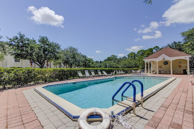 152 Brent Cir, Oldsmar, FL 34677 - pool with a patio area and fence