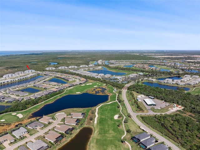 bird's eye view with golf course view and a water view