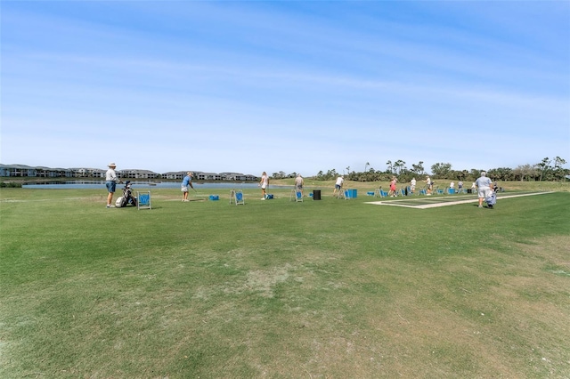 view of home's community with a lawn