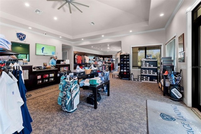 interior space featuring a tray ceiling, visible vents, ornamental molding, and recessed lighting