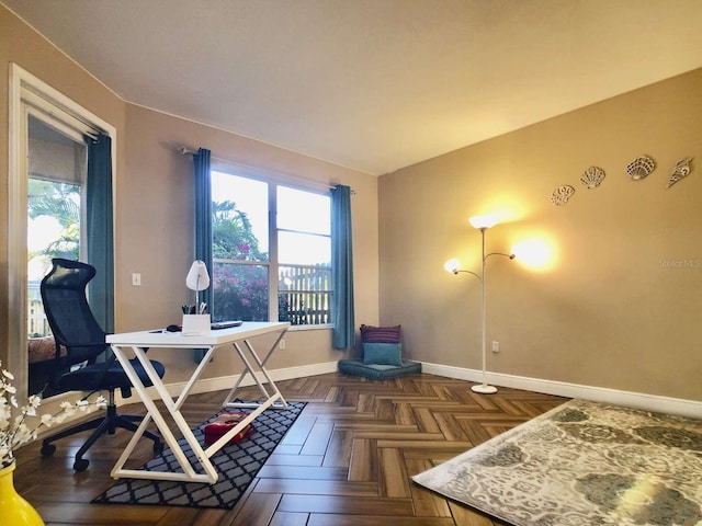 office featuring plenty of natural light and baseboards