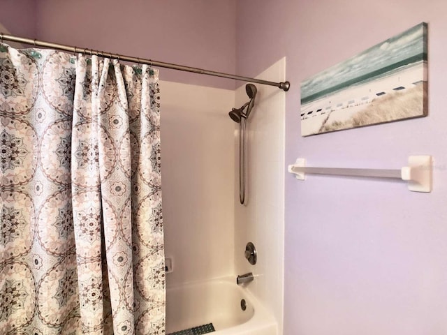 full bathroom featuring shower / tub combo with curtain