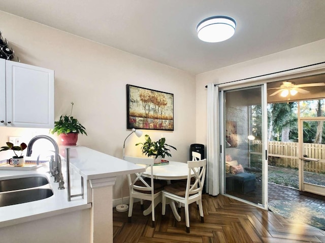 dining room featuring ceiling fan