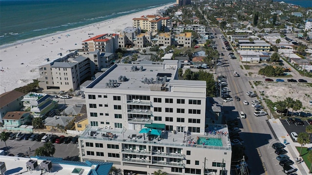 drone / aerial view with a water view and a view of the beach