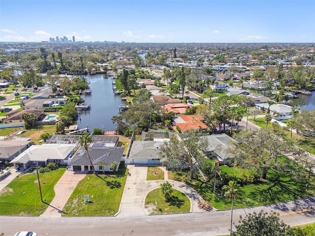 bird's eye view with a residential view and a water view