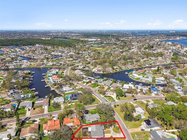 aerial view featuring a water view and a residential view