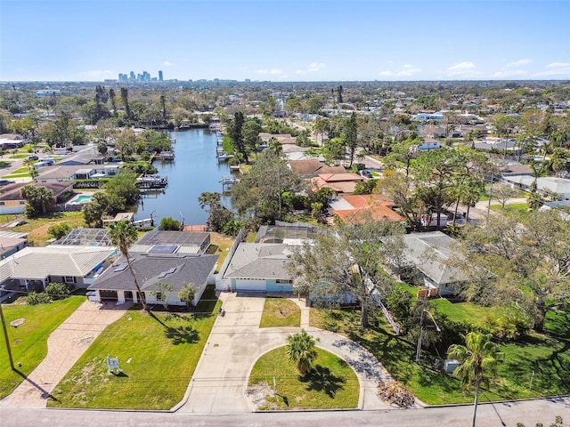 bird's eye view with a residential view and a water view