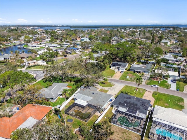 aerial view featuring a residential view and a water view