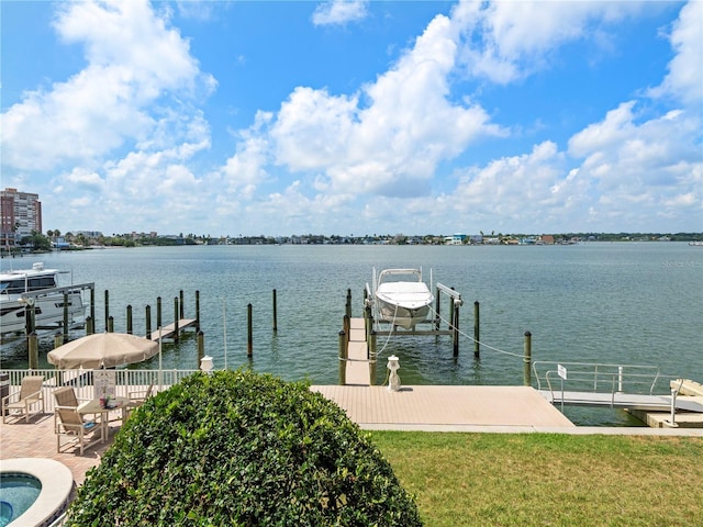 view of dock with a water view and boat lift