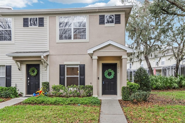 multi unit property featuring stucco siding