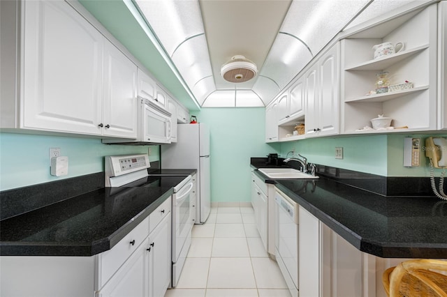 kitchen featuring open shelves, light tile patterned flooring, white cabinetry, a sink, and white appliances