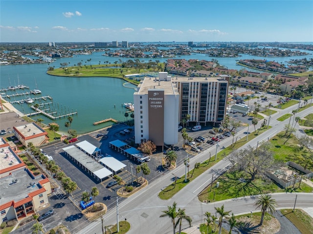 bird's eye view featuring a water view and a city view