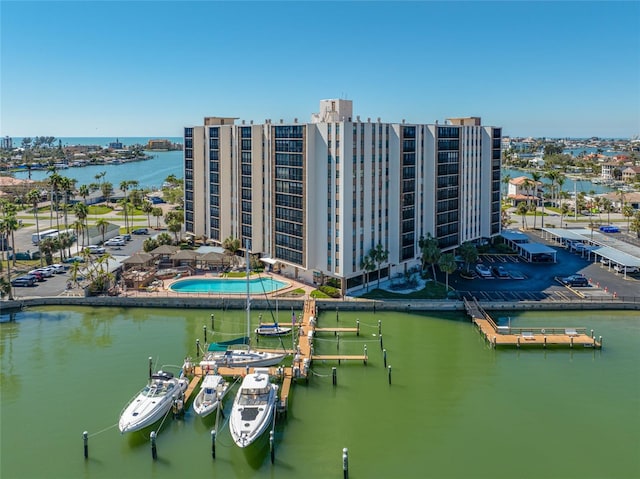 birds eye view of property with a water view