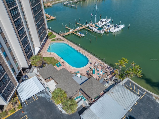 birds eye view of property with a water view