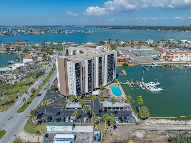 birds eye view of property featuring a water view