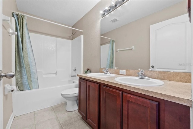 full bathroom with shower / tub combo with curtain, tile patterned flooring, a sink, and double vanity