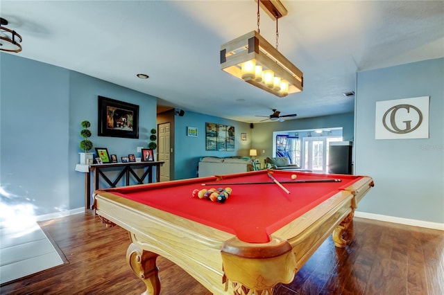 rec room with ceiling fan, baseboards, and wood finished floors