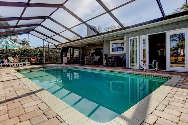 pool featuring a patio area and a lanai