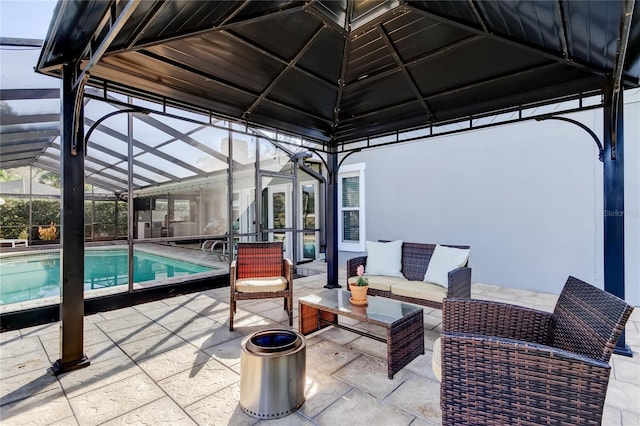 pool featuring a lanai, a patio area, and outdoor lounge area