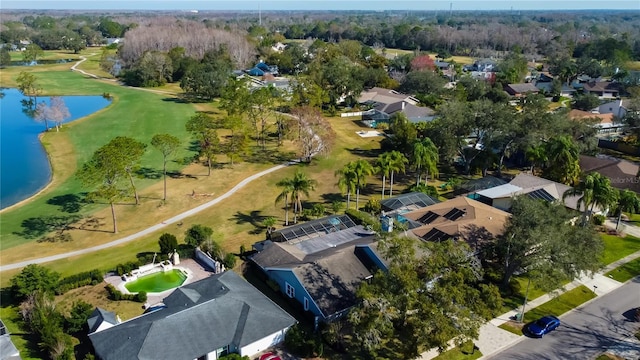 bird's eye view featuring a residential view, view of golf course, and a water view