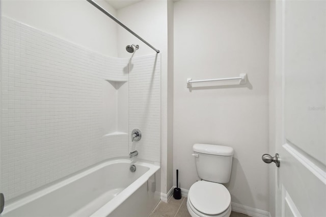 full bathroom featuring shower / bathtub combination, baseboards, toilet, and tile patterned floors