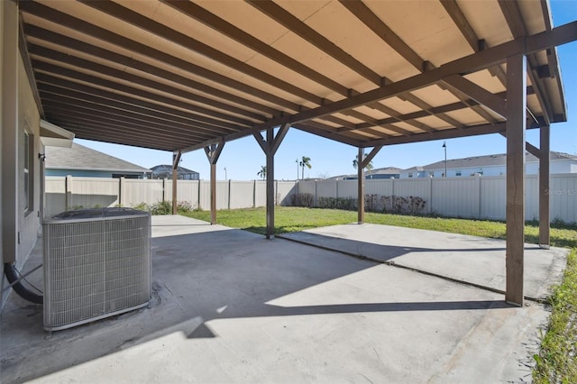 view of patio featuring a fenced backyard and central air condition unit