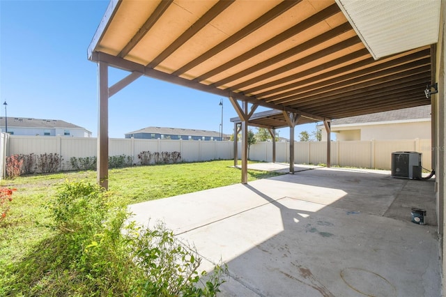 view of patio featuring a fenced backyard and central AC unit