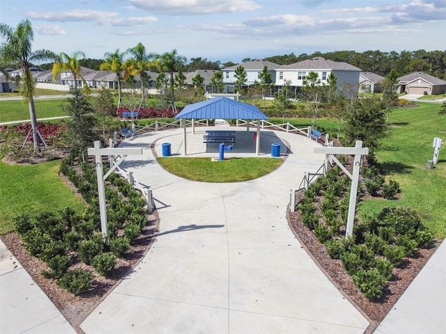 view of home's community with a residential view, a yard, and a gazebo