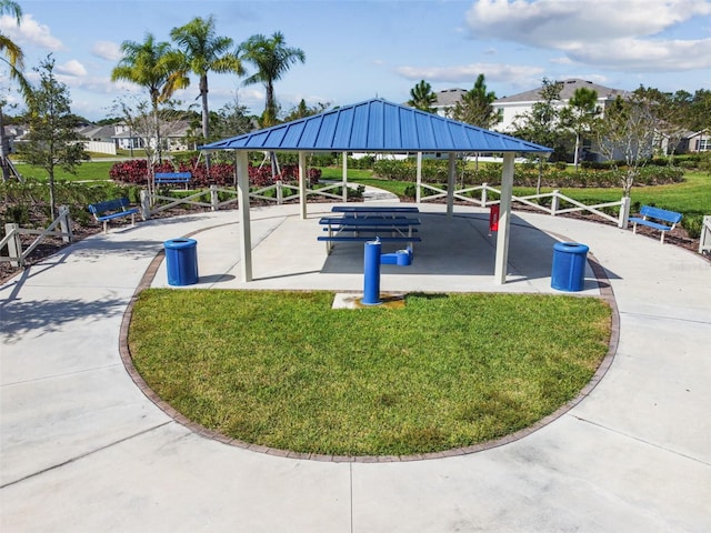 view of home's community with a yard and a gazebo