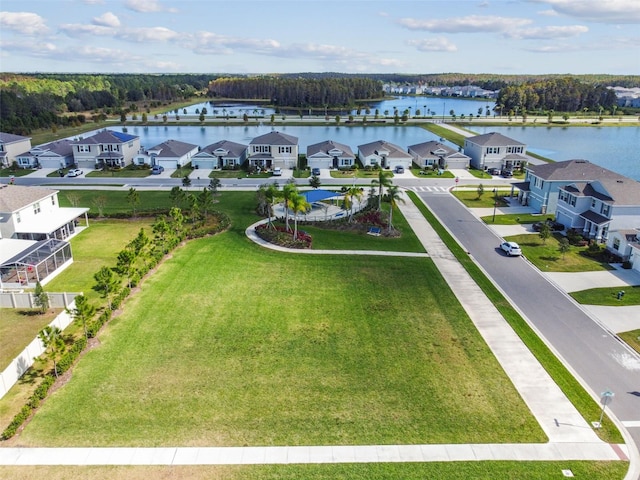 bird's eye view with a water view and a residential view