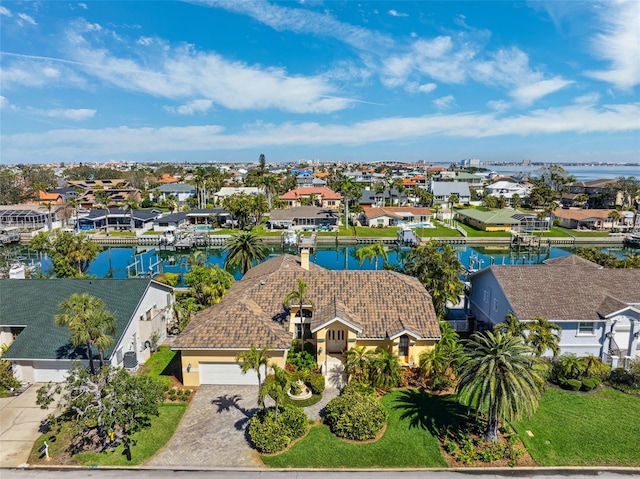 aerial view with a water view and a residential view