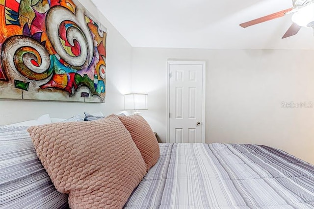 bedroom featuring ceiling fan