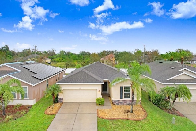 single story home featuring a garage, concrete driveway, stone siding, stucco siding, and a front lawn