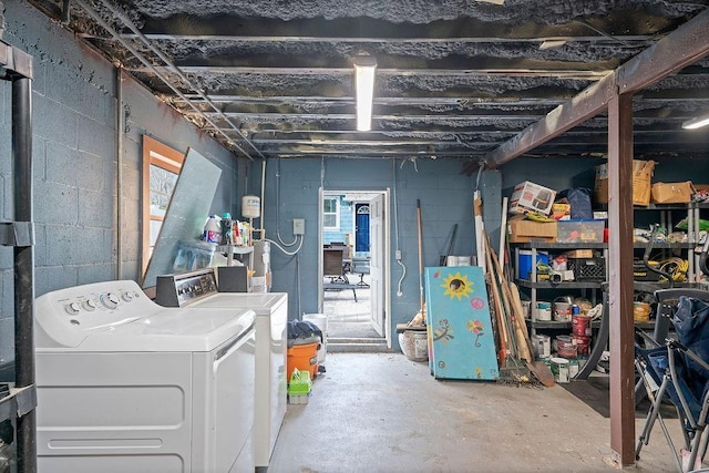 basement with washing machine and clothes dryer