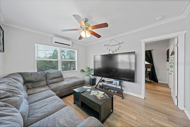 living room with crown molding, light wood finished floors, ceiling fan, a wall mounted air conditioner, and baseboards