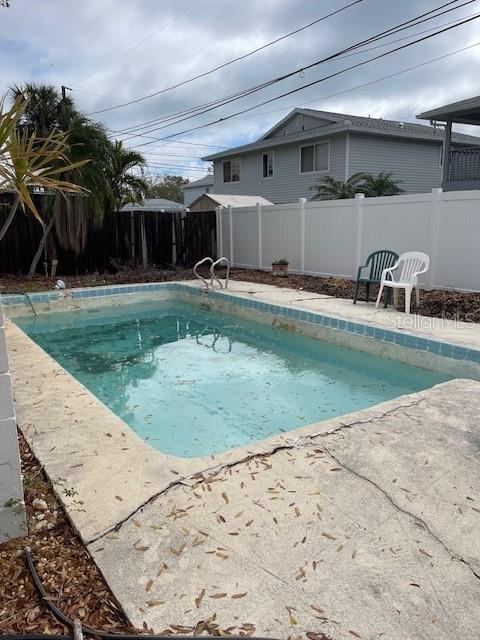 view of pool with a fenced in pool, a patio, and a fenced backyard