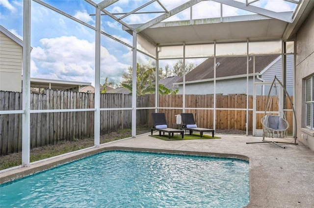 view of swimming pool with a fenced in pool, a patio area, and a fenced backyard