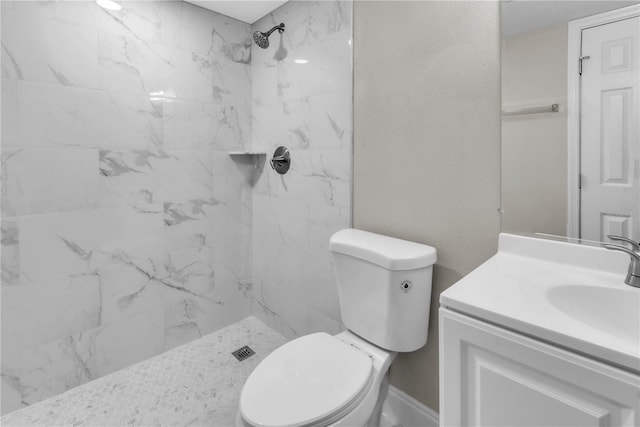8640 Tahoe Ct Unit 16, Tampa, FL 33614 - bathroom with a marble finish shower, vanity, and toilet