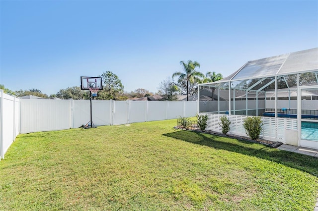 view of yard with a fenced in pool and a fenced backyard