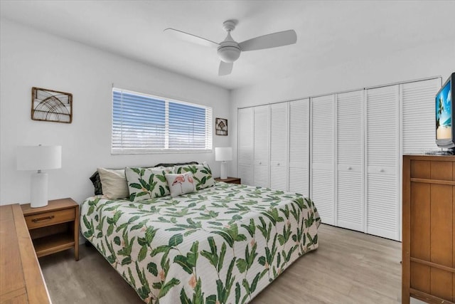 bedroom featuring light wood finished floors and ceiling fan