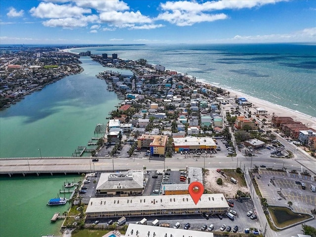 aerial view featuring a view of the beach and a water view