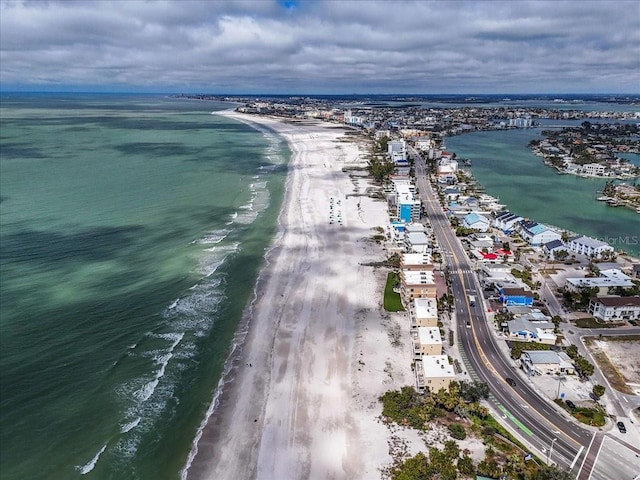 aerial view featuring a water view and a view of the beach