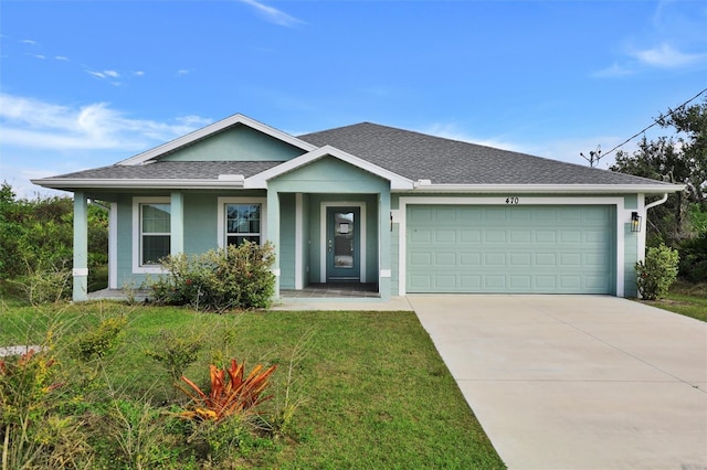 ranch-style house with a garage, a front yard, concrete driveway, and a shingled roof