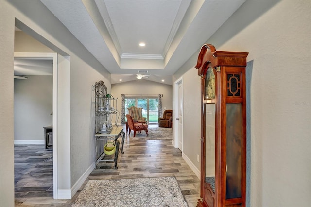 corridor with ornamental molding, recessed lighting, baseboards, and wood finished floors