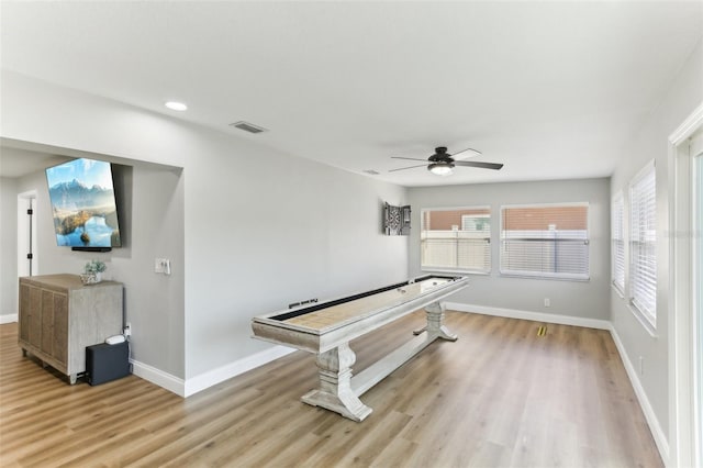 game room featuring baseboards, visible vents, a ceiling fan, light wood-style floors, and recessed lighting