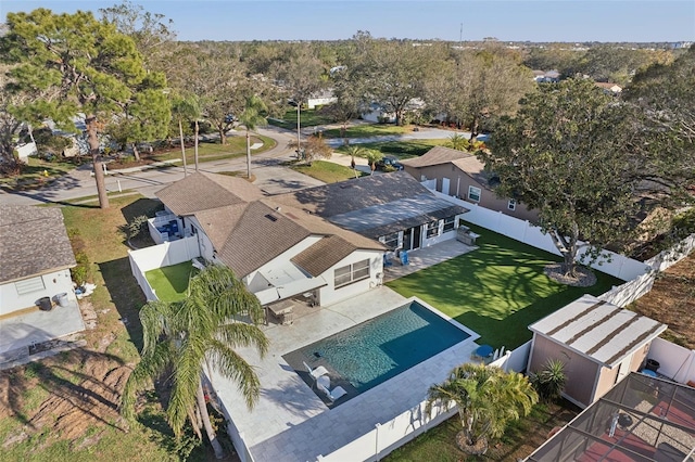 birds eye view of property with a residential view