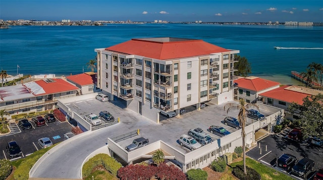 birds eye view of property featuring a water view