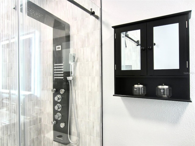 bathroom featuring french doors and a stall shower